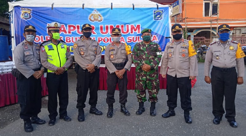 Polres Buton dan Koramil Pasarwajo Bagikan 150 Nasi Kotak Pada Masyarakat