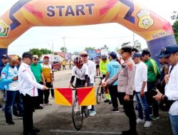 Wakili Kapolri, Kapolres Buton Membuka Secara Resmi Pertandingan Balap Sepeda Porprov XIV Sultra