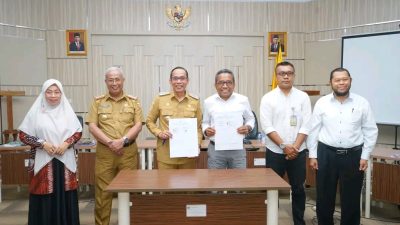 Pj. Bupati Buton Teken MoU dengan Rektor UHO Kendari