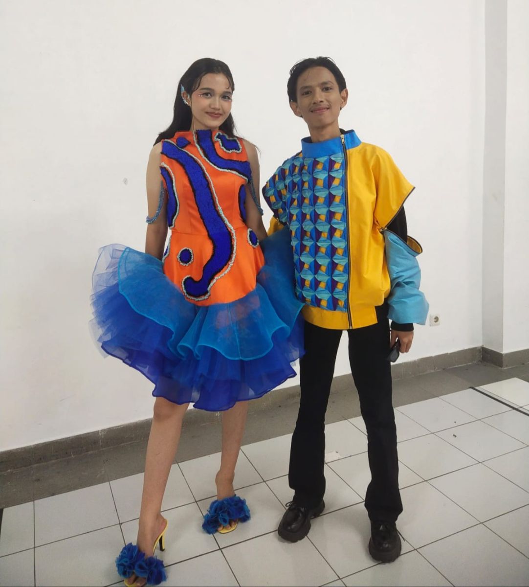 Terinspirasi Ikan Mandarin Fish, Mahasiswa Asal Buton Ciptakan Baju Pesta