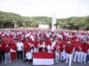 Sekda Sultra Launching Gerakan Pembagian Bendera Merah Putih