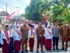 Bupati dan Wakil Bupati Buton Resmi Membuka Lomba Gerak Jalan Indah HUT RI Ke-80