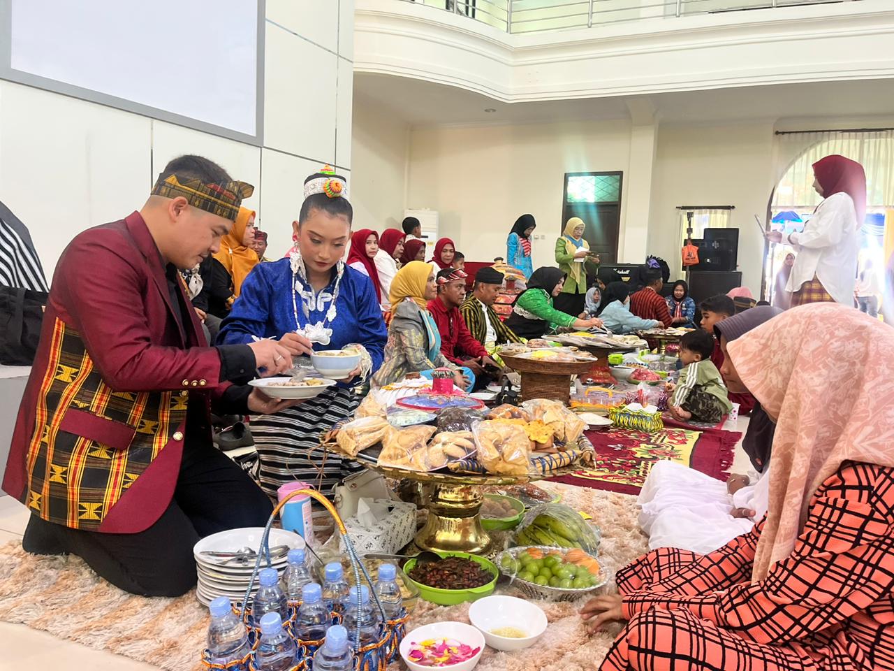 BRI BO Baubau Ikuti Tradisi “Pakandeana Ana Maelu" HUT Kota Baubau